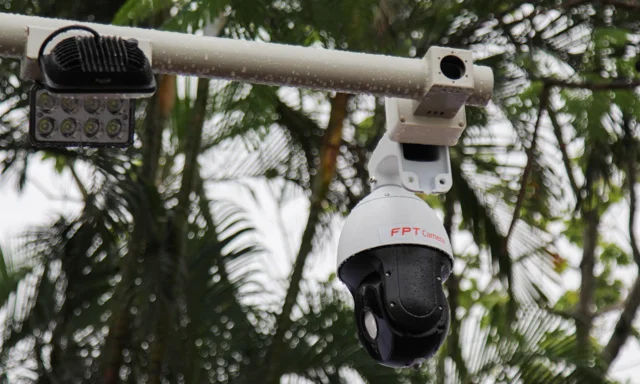 Sleek, modern home security camera blending into a bookshelf